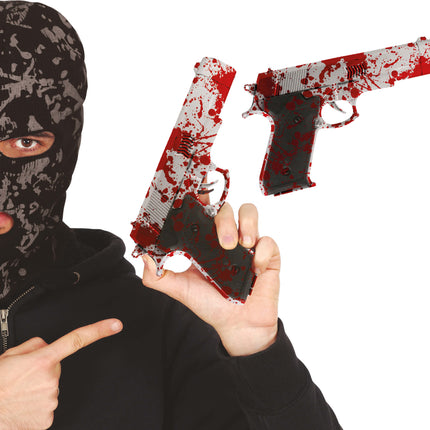 Halloweenowy sztuczny pistolet z krwią 24 cm