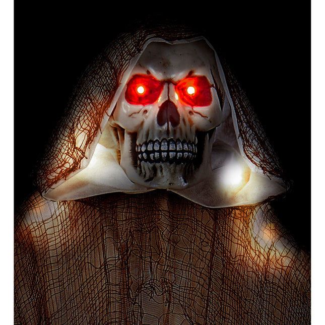 Halloweenowa lalka żniwiarz ze światłem