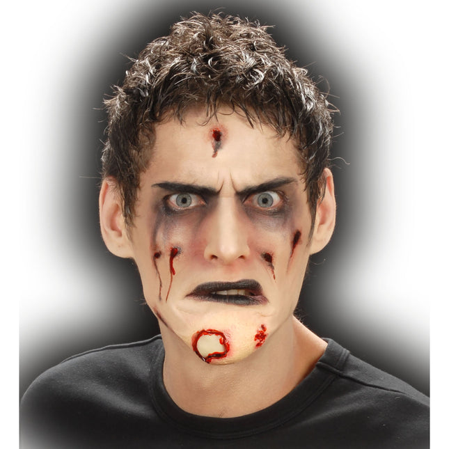 Podbródek Zombie z fałszywą raną na Halloween