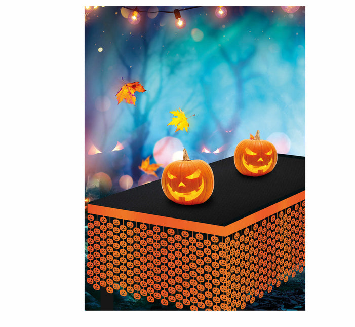 Pomarańczowa spódnica na stół Halloween Czaszki 4m