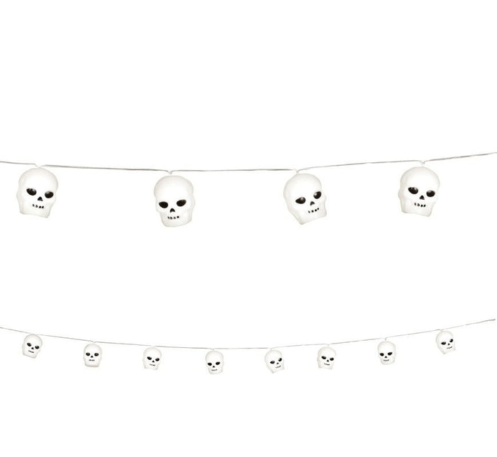 Halloween Lichtslinger Doodshoofden 1,8m van Fiestas Guirca koop je bij Partywinkel