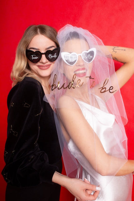 Hartvormige bril met tekst 'Team Bride', zwart van Partydeco koop je bij Partywinkel